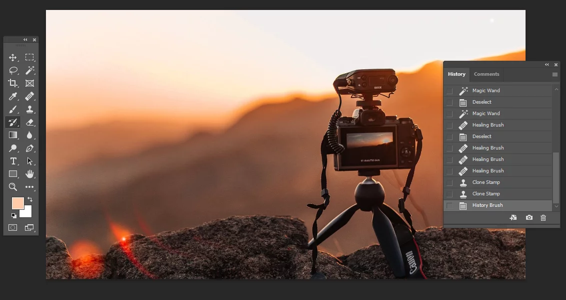 History brush tool undoing the rock changes from the clone stamp tool