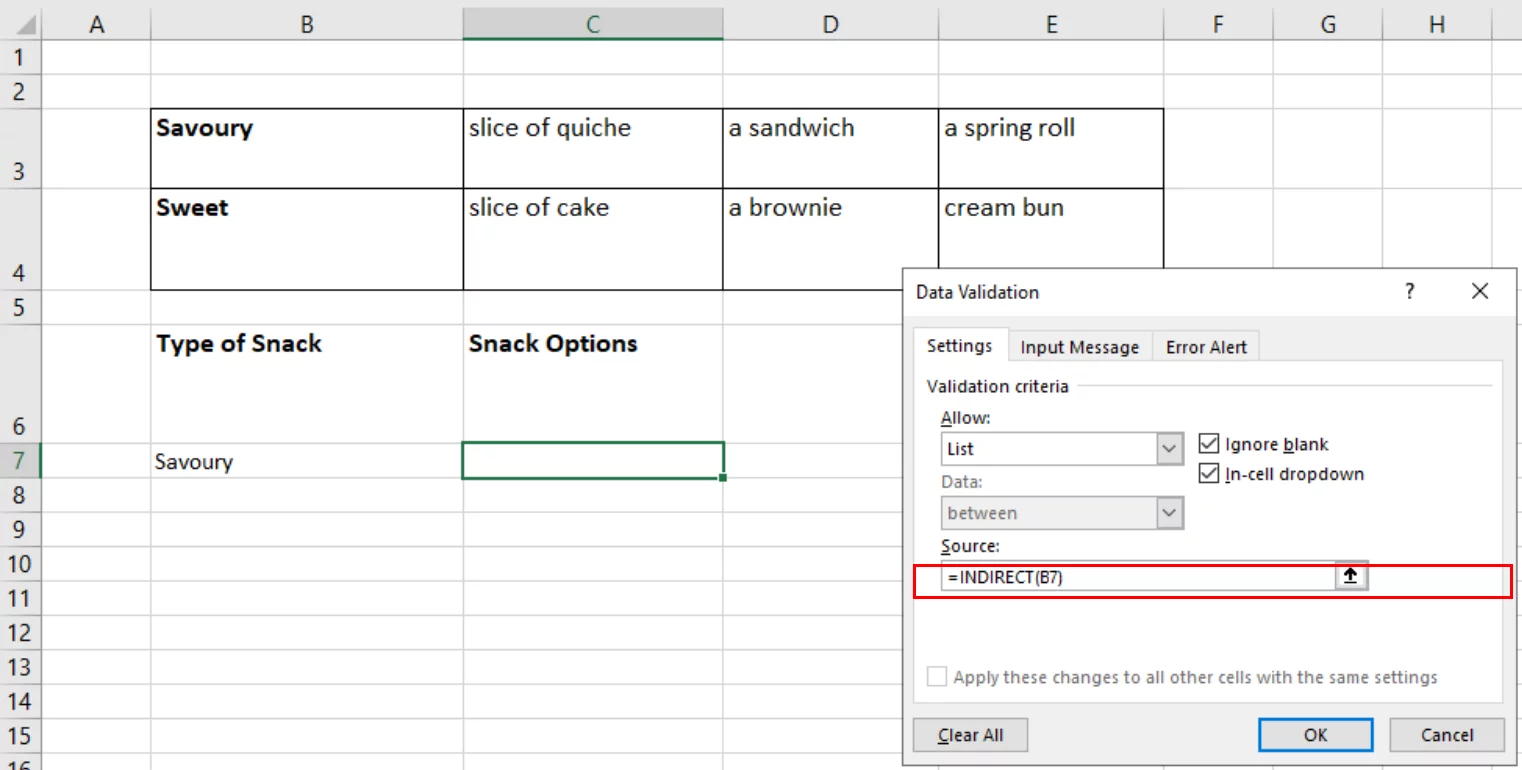 Screenshot showing the INDIRECT formula entered into the Source box in the Settings tab of the Data Validation Dialog Box