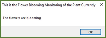 Screenshot showing the message box displaying the text: the flowers are blooming.